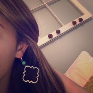 Silver earrings with blue bead